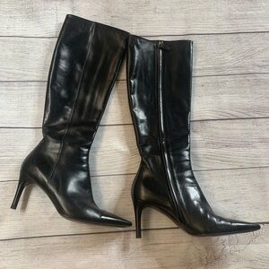 Gucci tall black thin heel boots.